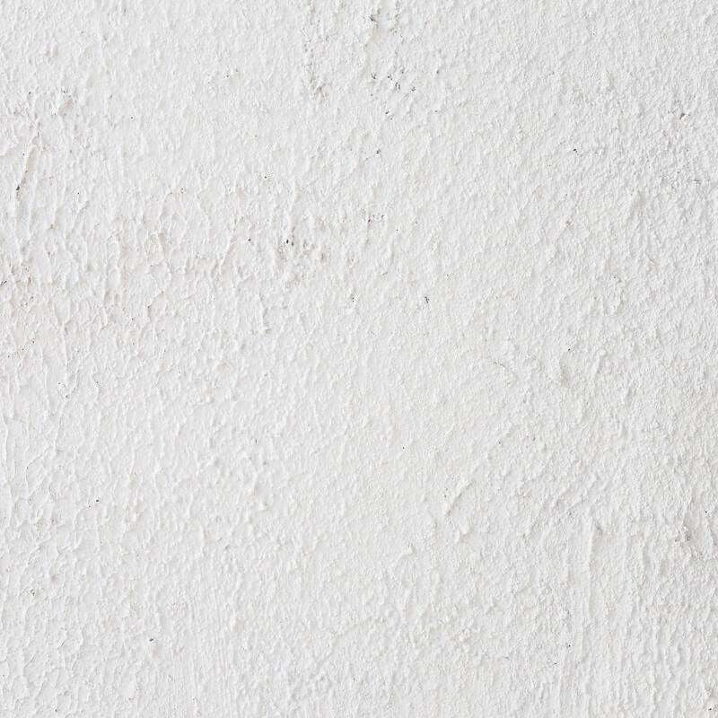 Een muur met een fijne structuurverf